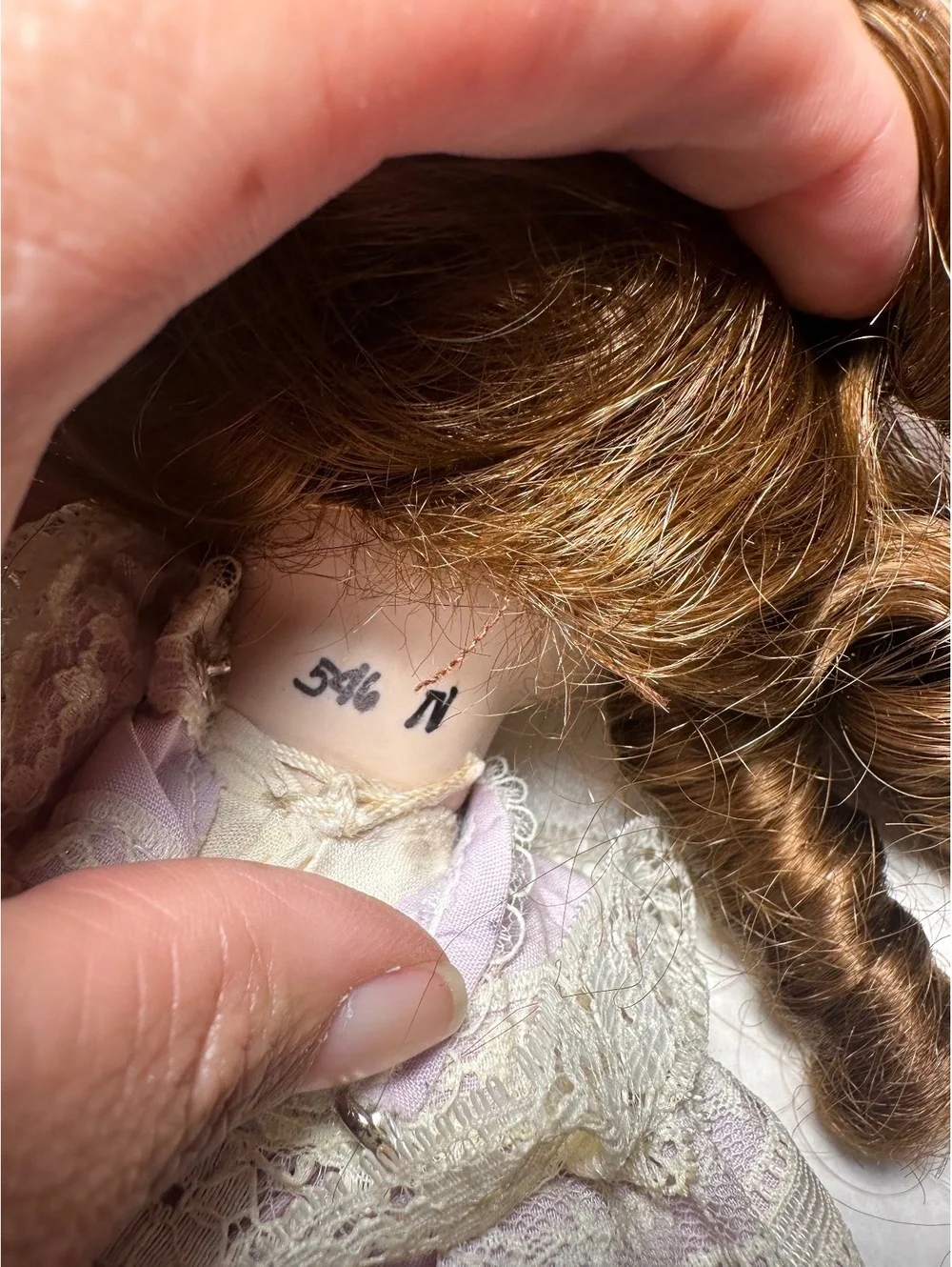 Vintage Porcelain Doll with Lavender Dress and Lace Details